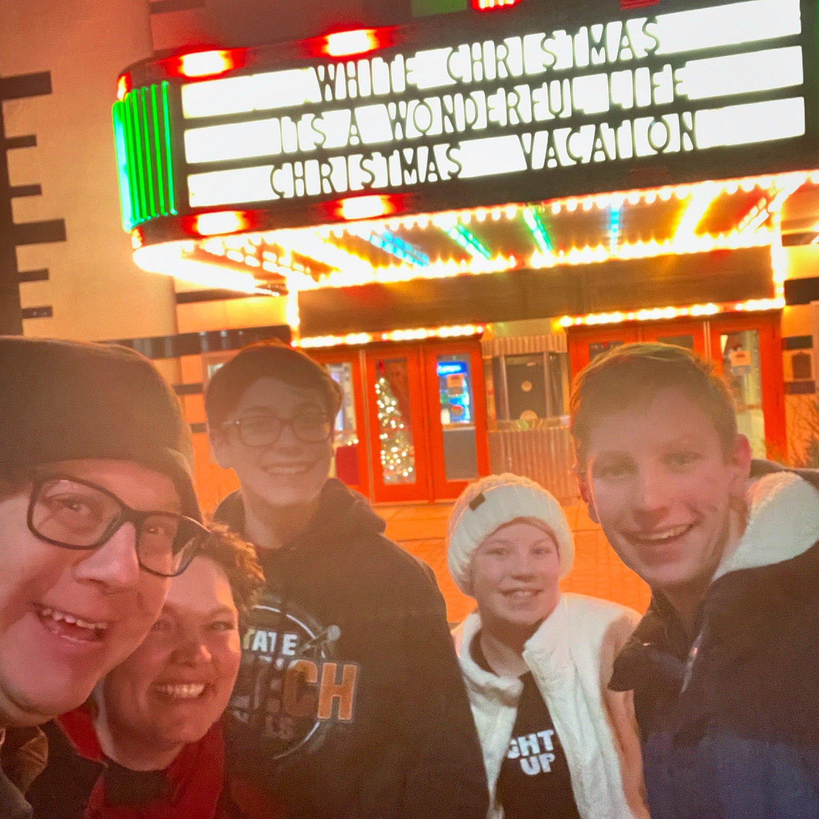 Lucinda Miller and her family at the historic Normal Theater in Uptown Normal